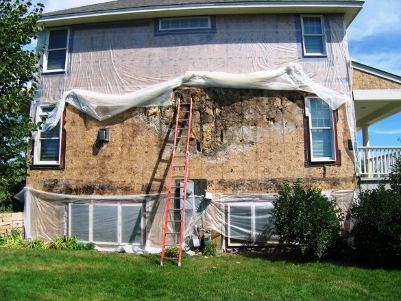 Visa av väggen frame hus efter demontering sidospår. Minnesota, USA.