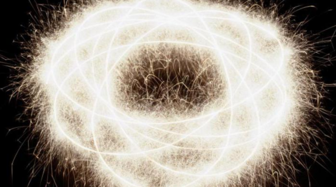Abstrakt bild av en snurrande elektron
