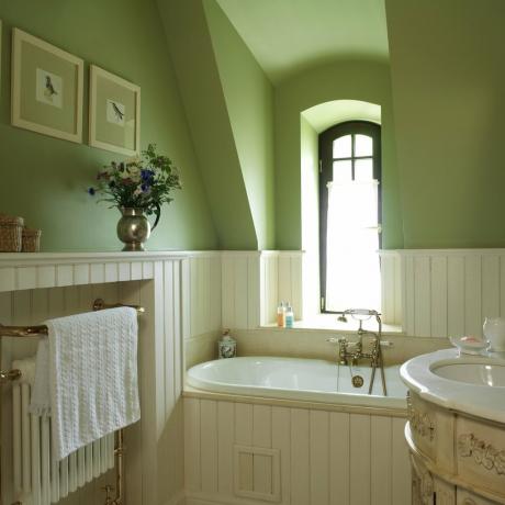 Ett badrum i gröna toner. Fotokälla: devhata.ru